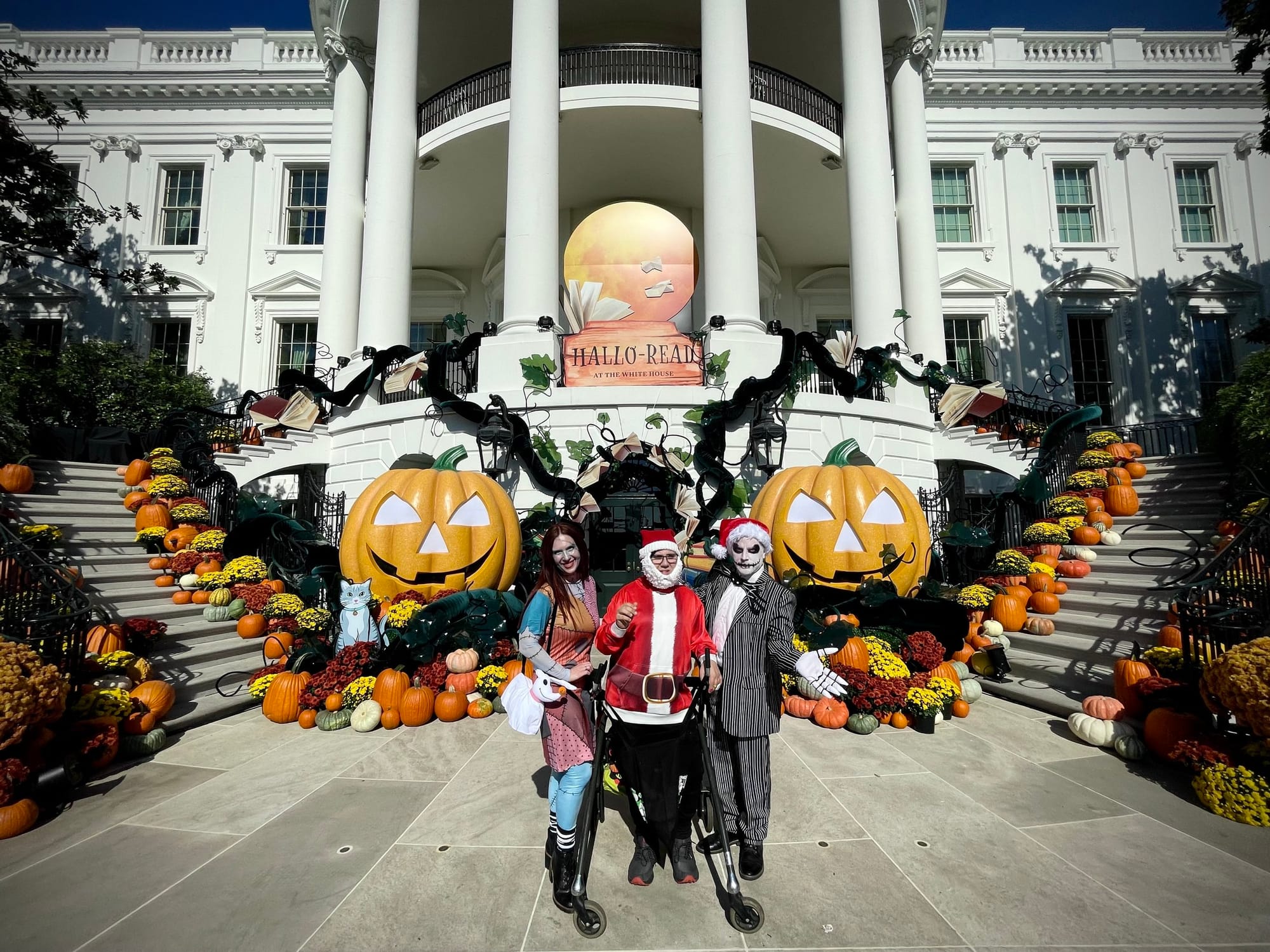 Little Lobbyists Santa (Simon) with Jack and Sally from the Nightmare before Christmas (aka Laura and Brian, his mom and dad) strike a pose in front of the White House Hallo-read decorations