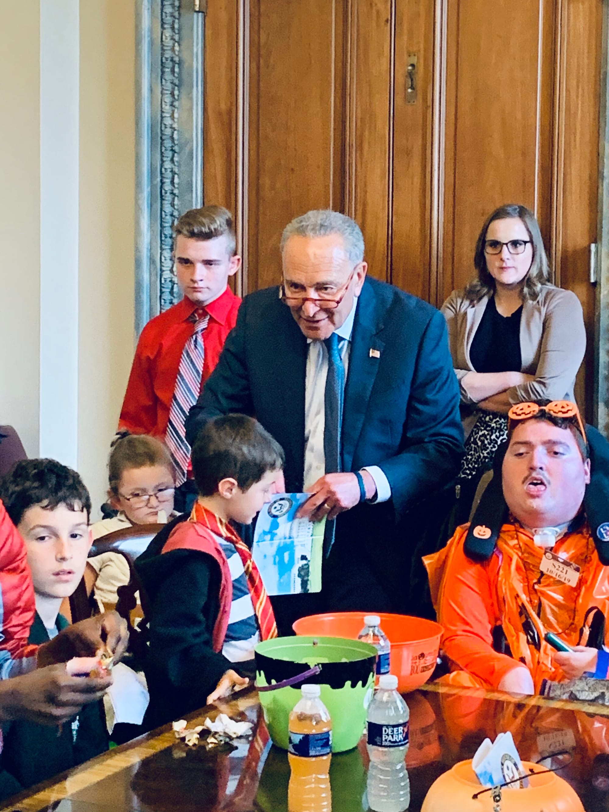 The Senate Minority Leader hands out candy during a Little Lobbyists’ trick or treat day on Capitol Hill.