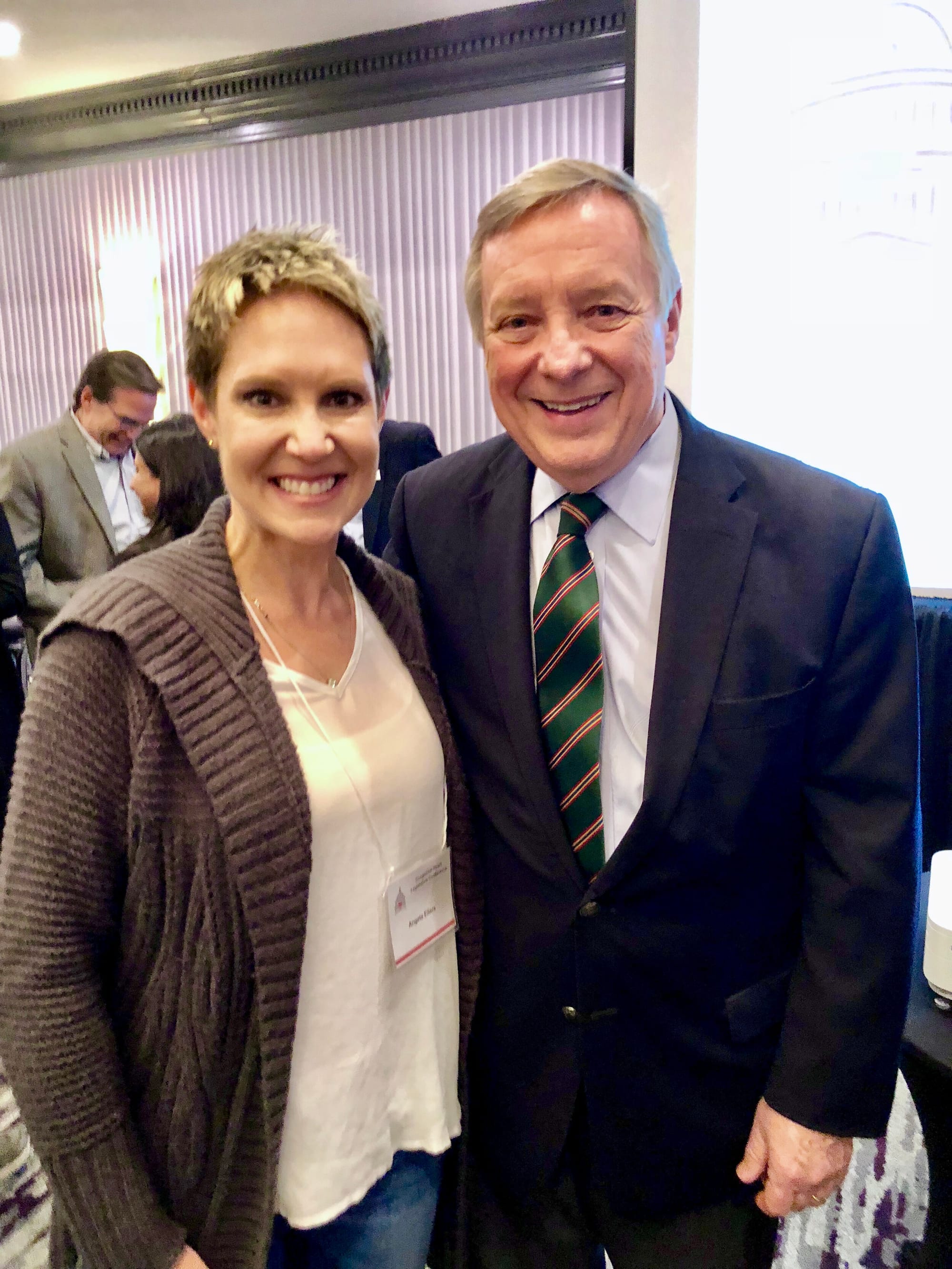 A Little Lobbyists mom poses with a U.S. Senator.