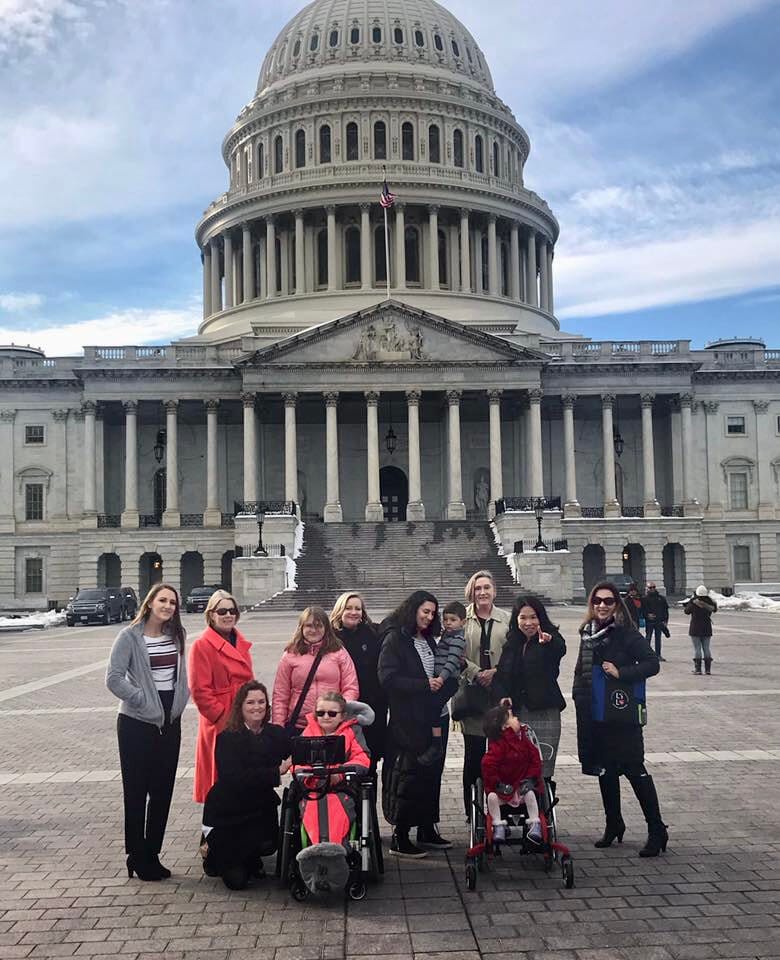 Little Lobbyists pose in front of the U.S. Capitol.