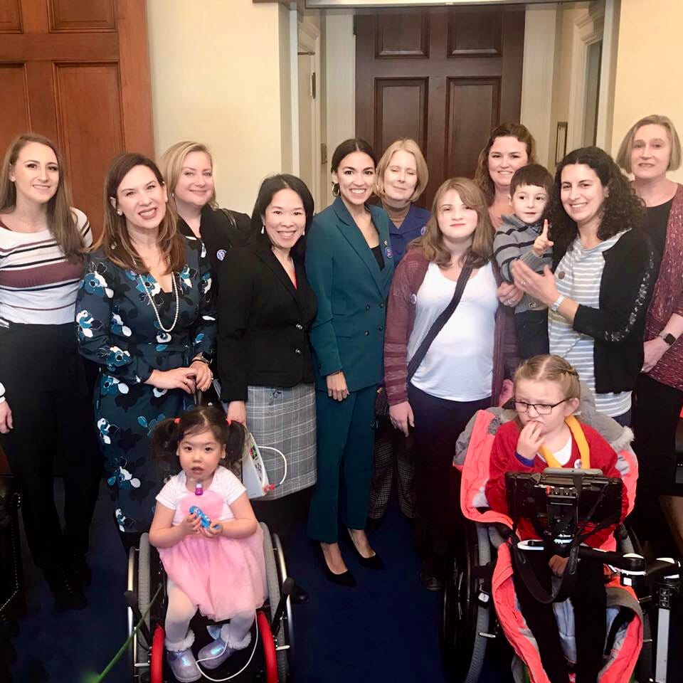 Little Lobbyists pose with a new member of the House of Representatives.