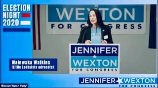 Walewska Watkins speaking at Rep. Wexton’s Election Night celebration. [image description: A computer screenshot with blue graphics and featuring a tall woman with long black hair at a podium, wearing a Little Lobbyists t-shirt.]Walewska Watkins hab…
