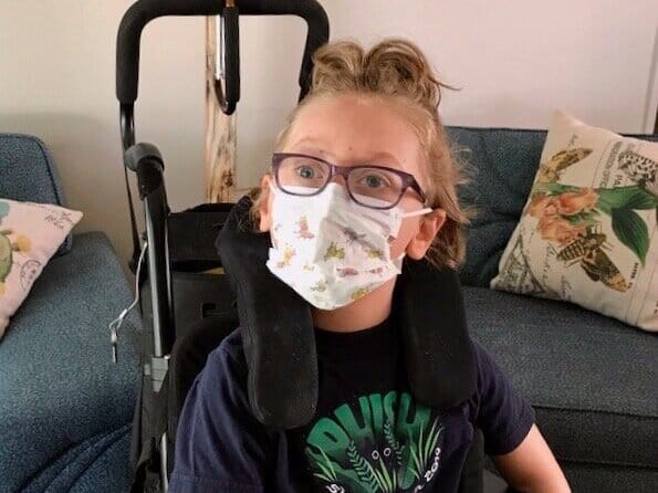 Olive wearing her mask