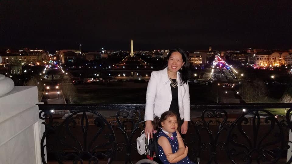 Elena and Xiomara on the Speaker’s balcony in front of a spectacular view of Washington D.C. at night.