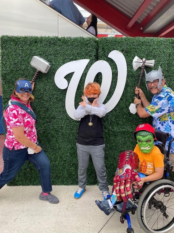 The Witzlers dressed up as Marvel characters.