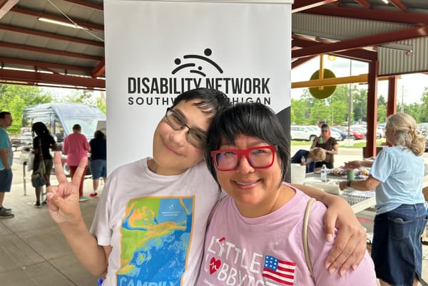 Bo and Kinn at a Disability Network of Southwest Michigan event. 